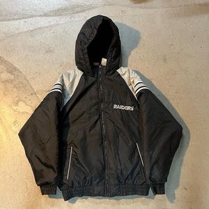 Vintage black raiders puffer jacket
